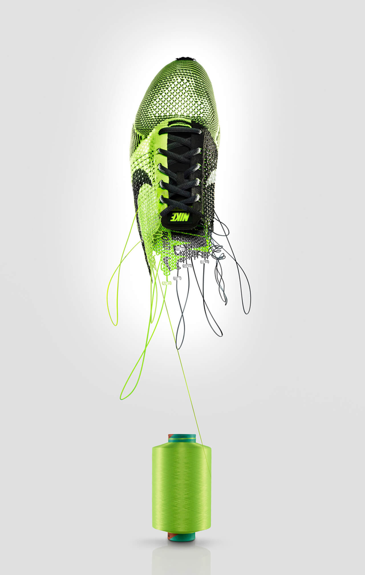 Computer generated image of a green and black sports shoe being untangled from a cotton reel